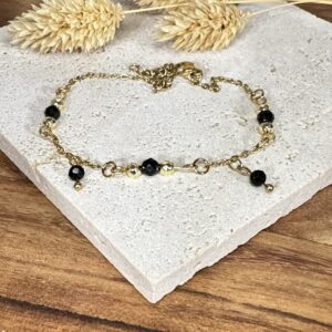 Bracelet spinelle noire et hématite dorée